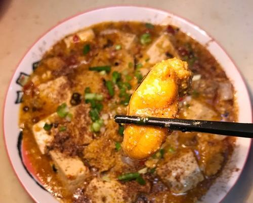 以鱼子豆腐为主料的美食制作（做出美味无比的鱼子豆腐，尝一尝独特的风味）