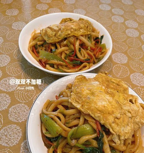 探秘新疆特色美食——炒拉条子（传统手工技艺打造的美味佳肴，让你回味无穷）