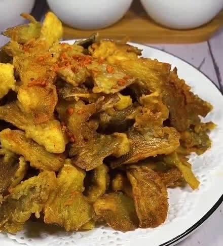 香酥蘑菇的制作方法（让你在家也能轻松做出餐馆级别的美味小吃）