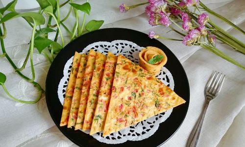 剩米饭鸡蛋饼的制作方法（利用厨余食材轻松做美食）